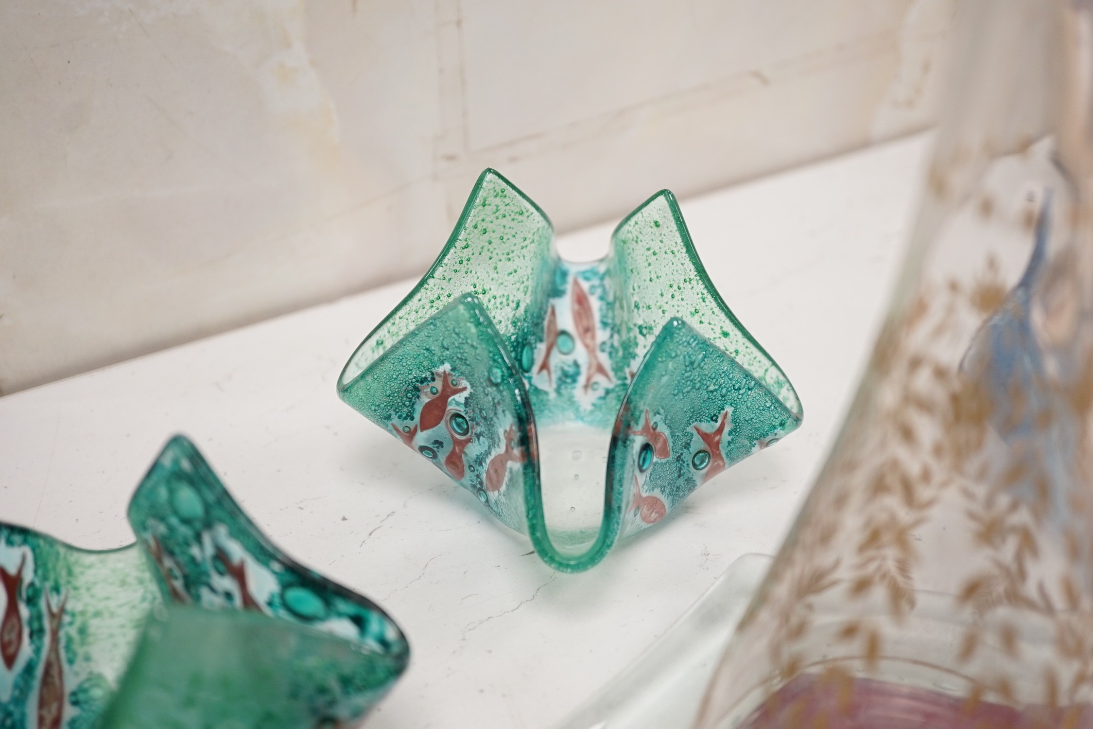 Three glass handkerchief vases and six other glass items